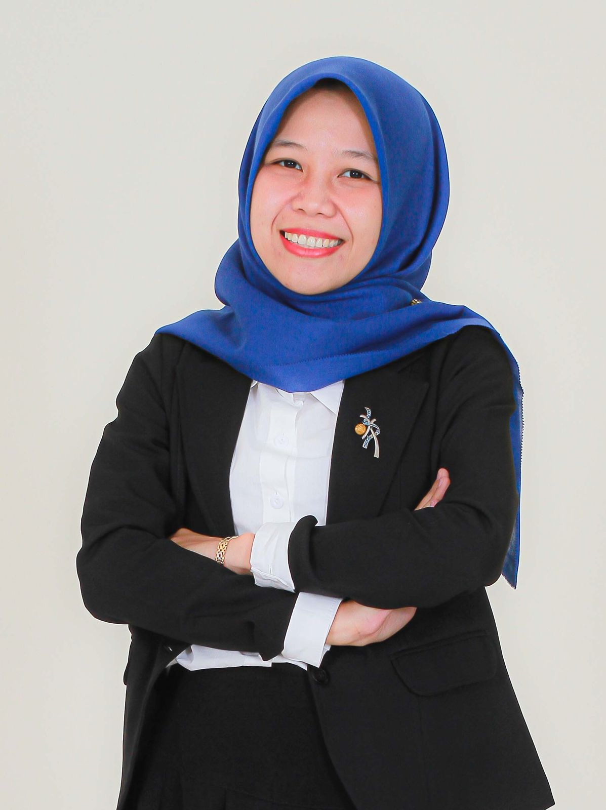 Dr. Ela Suryani, M.Pd